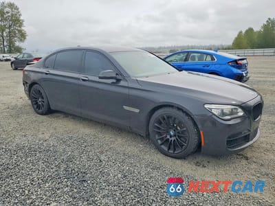Czwarte zdjęcie samochodu z boku: 2013 BMW 750 LI VIN:WBAYE8C57DD133456 - miniatura