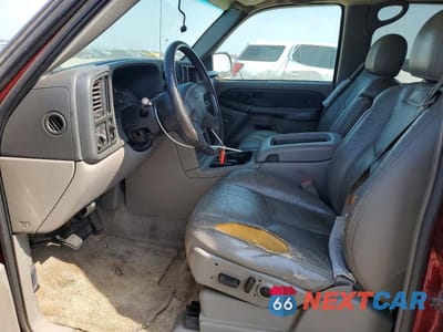 Zdjęcie 7 z 13 samochodu: 2003 CHEVROLET SUBURBAN VIN:1GNEC16Z83J166829 - miniatura