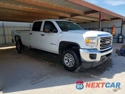 Czwarte zdjęcie samochodu z boku: 2019 GMC SIERRA K2500 HEAVY DUTY VIN:1GT12NEG1KF208079 - miniatura