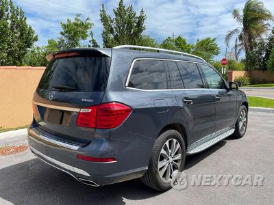 Czwarte zdjęcie samochodu z boku: 2015 MERCEDES-BENZ GL 450 4MATIC VIN:4JGDF6EE5FA598124 - miniatura