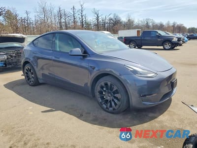 Czwarte zdjęcie samochodu z boku: 2023 TESLA MODEL Y VIN:7SAYGAEE2PF836805 - miniatura