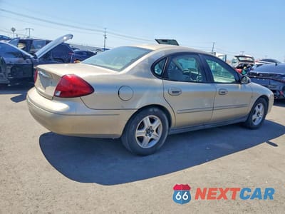 Trzecie zdjęcie samochodu z tyłu: 2000 FORD TAURUS SEL VIN:1FAFP56S0YG130476 - miniatura