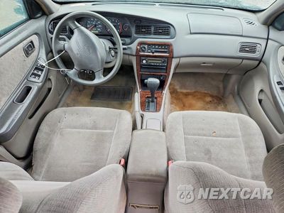 Zdjęcie 8 z 12 samochodu: 2000 NISSAN ALTIMA XE VIN:1N4DL01D6YC217675 - miniatura