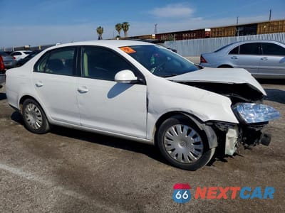 Czwarte zdjęcie samochodu z boku: 2009 VOLKSWAGEN JETTA S VIN:3VWJZ71KX9M062886 - miniatura
