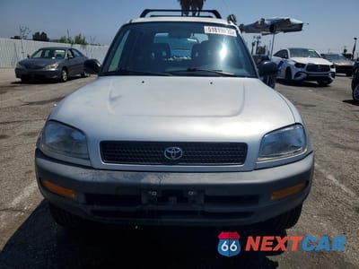 Piąte zdjęcie samochodu w środku: 1997 TOYOTA RAV4 BASE VIN:JT3GP10VXV7019668 - miniatura