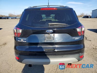 Zdjęcie 6 z 13 samochodu: 2017 FORD ESCAPE TITANIUM VIN:1FMCU9JD6HUD56539 - miniatura
