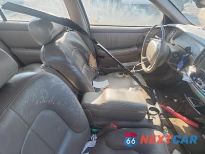 Zdjęcie 12 z 13 samochodu: 1998 BUICK PARK AVENUE VIN:1G4CW52K4W4636750 - miniatura
