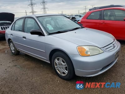 Czwarte zdjęcie samochodu z boku: 2001 HONDA CIVIC LX VIN:1HGES165X1L049779 - miniatura