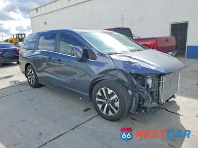 Czwarte zdjęcie samochodu z boku: 2025 HONDA ODYSSEY EXL VIN:5FNRL6H64SB038684 - miniatura