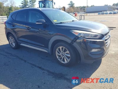 Czwarte zdjęcie samochodu z boku: 2017 HYUNDAI TUCSON SE PLUS VIN:KM8J3CA4XHU452178 - miniatura