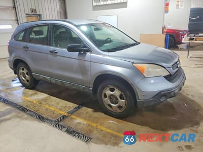 Czwarte zdjęcie samochodu z boku: 2009 HONDA CR-V LX VIN:JHLRE483X9C014324 - miniatura
