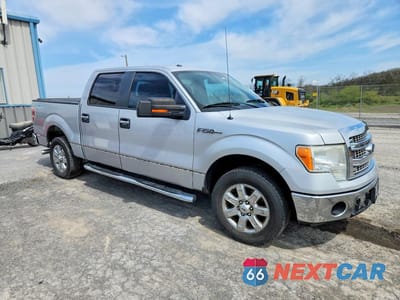 Czwarte zdjęcie samochodu z boku: 2014 FORD F150 SUPERCREW VIN:1FTFW1CF0EKD01135 - miniatura