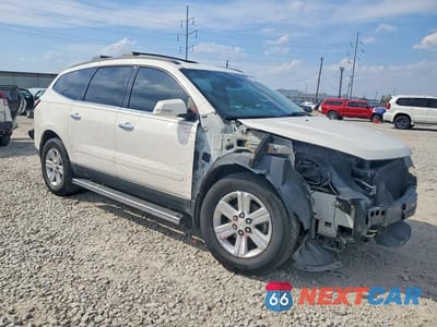 Czwarte zdjęcie samochodu z boku: 2014 CHEVROLET TRAVERSE LT VIN:1GNKRHKD4EJ110989 - miniatura