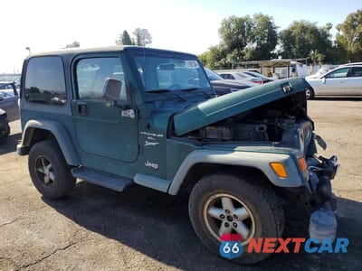 Czwarte zdjęcie samochodu z boku: 2000 JEEP WRANGLER / TJ SPORT VIN:1J4FA49S9YP721689 - miniatura