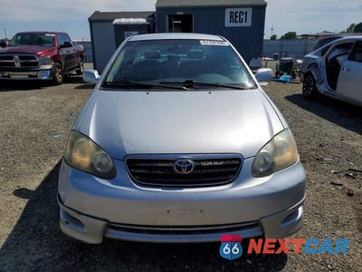 Piąte zdjęcie samochodu w środku: 2005 TOYOTA COROLLA S VIN:1NXBR32E45Z391173 - miniatura