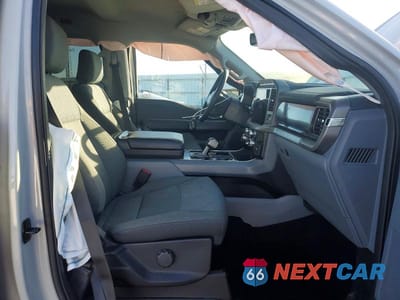 Zdjęcie 7 z 12 samochodu: 2024 FORD F150 LIGHTNING XLT VIN:1FTVW3LK1RWG31174 - miniatura