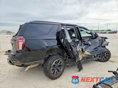 Trzecie zdjęcie samochodu z tyłu: 2022 CHEVROLET TAHOE K1500 Z71 VIN:1GNSKPKDXNR119938 - miniatura