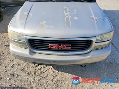 Zdjęcie 12 z 13 samochodu: 2006 GMC YUKON XL K1500 VIN:1GKFK16Z96J138482 - miniatura