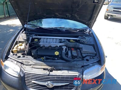 Zdjęcie 7 z 10 samochodu: 1999 CHRYSLER SEBRING JXI VIN:3C3EL55H6XT591641 - miniatura