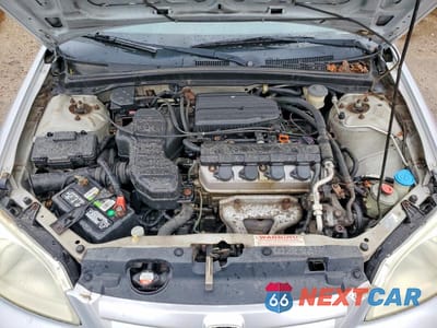 Zdjęcie 11 z 12 samochodu: 2001 HONDA CIVIC LX VIN:1HGES165X1L049779 - miniatura