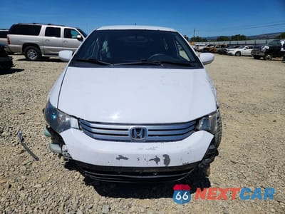 Piąte zdjęcie samochodu w środku: 2010 HONDA INSIGHT EX VIN:JHMZE2H71AS036189 - miniatura