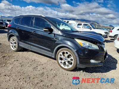 Czwarte zdjęcie samochodu z boku: 2015 FORD ESCAPE TITANIUM VIN:1FMCU0J97FUB25248 - miniatura