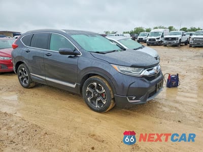 Czwarte zdjęcie samochodu z boku: 2019 HONDA CR-V TOURING VIN:7FARW1H91KE006879 - miniatura
