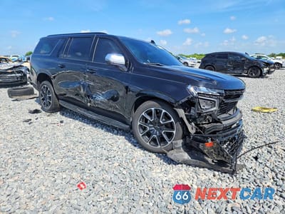 Czwarte zdjęcie samochodu z boku: 2023 CHEVROLET SUBURBAN C1500 RST VIN:1GNSCEKD4PR343579 - miniatura