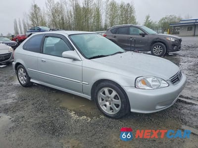 Czwarte zdjęcie samochodu z boku: 1999 HONDA CIVIC DX VIN:2HGEJ6347XH106263 - miniatura