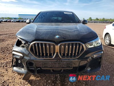 Piąte zdjęcie samochodu w środku: 2021 BMW X6 M50I VIN:5UXCY8C07M9G38166 - miniatura
