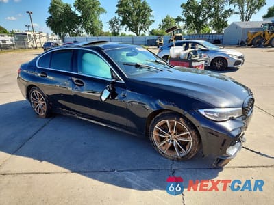 Czwarte zdjęcie samochodu z boku: 2022 BMW 330I VIN:3MW5R1J07N8C46277 - miniatura