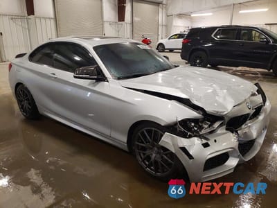 Czwarte zdjęcie samochodu z boku: 2015 BMW M235I XDRIVE VIN:WBA1J9C51FV371187 - miniatura