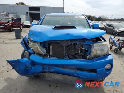 Piąte zdjęcie samochodu w środku: 2011 TOYOTA TACOMA V6 VIN:3TMMU4FN2BM034571 - miniatura