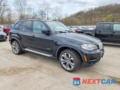 Czwarte zdjęcie samochodu z boku: 2013 BMW X5 XDRIVE50I VIN:5UXZV8C56D0C14562 - miniatura