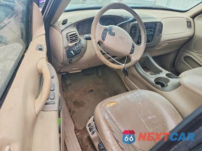 Zdjęcie 8 z 13 samochodu: 1998 FORD EXPEDITION EL EDDIE BAUER VIN:1FMRU1763WLA53631 - miniatura