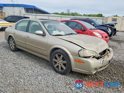 Czwarte zdjęcie samochodu z boku: 2002 NISSAN MAXIMA GXE VIN:JN1DA31D22T409526 - miniatura