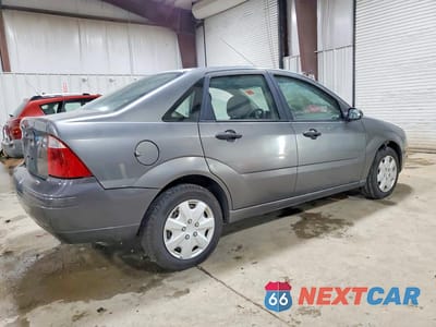 Trzecie zdjęcie samochodu z tyłu: 2005 FORD FOCUS ZX4 VIN:1FAHP34N65W110096 - miniatura