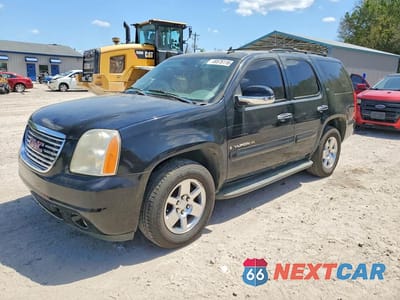 2009 GMC YUKON SLT 1GKEC33329R220211 - główne zdjęcie licytacji z USA - miniatura