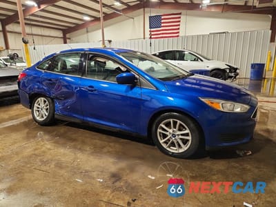 Czwarte zdjęcie samochodu z boku: 2018 FORD FOCUS SE VIN:1FADP3F28JL201769 - miniatura