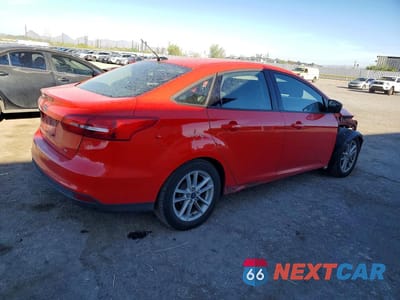 Trzecie zdjęcie samochodu z tyłu: 2017 FORD FOCUS SE VIN:1FADP3F28HL334509 - miniatura