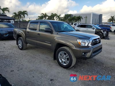 Czwarte zdjęcie samochodu z boku: 2013 TOYOTA TACOMA V6 VIN:5TFLU4ENXDX064735 - miniatura