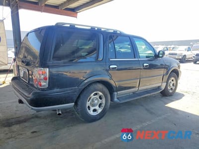 Trzecie zdjęcie samochodu z tyłu: 2002 LINCOLN NAVIGATOR VIN:5LMFU28R71LJ22036 - miniatura