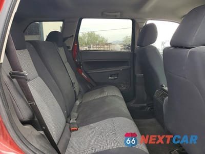 Zdjęcie 11 z 12 samochodu: 2010 JEEP GRAND CHEROKEE LAREDO VIN:1J4PR4GK2AC139866 - miniatura