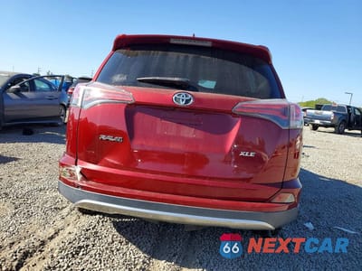 Zdjęcie 6 z 12 samochodu: 2018 TOYOTA RAV4 XLE VIN:JTMWFREV4JD110576 - miniatura