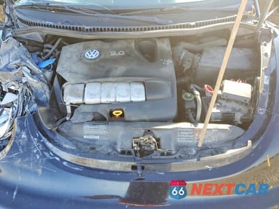 Zdjęcie 11 z 12 samochodu: 2003 VOLKSWAGEN NEW BEETLE GLS VIN:3VWCK21YX3M317841 - miniatura