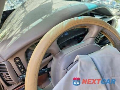 Zdjęcie 9 z 13 samochodu: 2000 BUICK PARK AVENUE VIN:1G4CW52K1Y4128108 - miniatura
