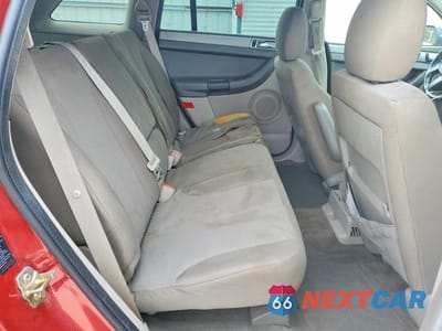 Zdjęcie 11 z 13 samochodu: 2005 CHRYSLER PACIFICA VIN:2C8GM48LX5R533395 - miniatura