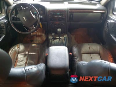 Zdjęcie 8 z 13 samochodu: 2002 JEEP GRAND CHEROKEE LIMITED VIN:1J4GW58N12C263779 - miniatura