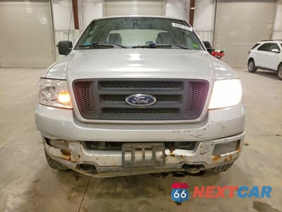 Piąte zdjęcie samochodu w środku: 2004 FORD F150 VIN:1FTPX14534FA31865 - miniatura