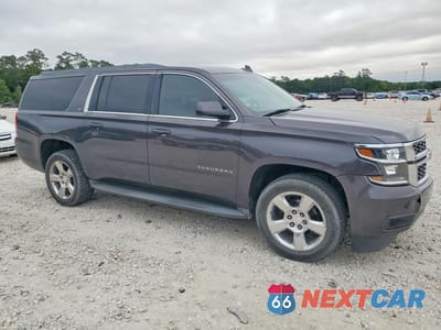 Czwarte zdjęcie samochodu z boku: 2015 CHEVROLET SUBURBAN C1500 LT VIN:1GNSCJKC4FR524194 - miniatura